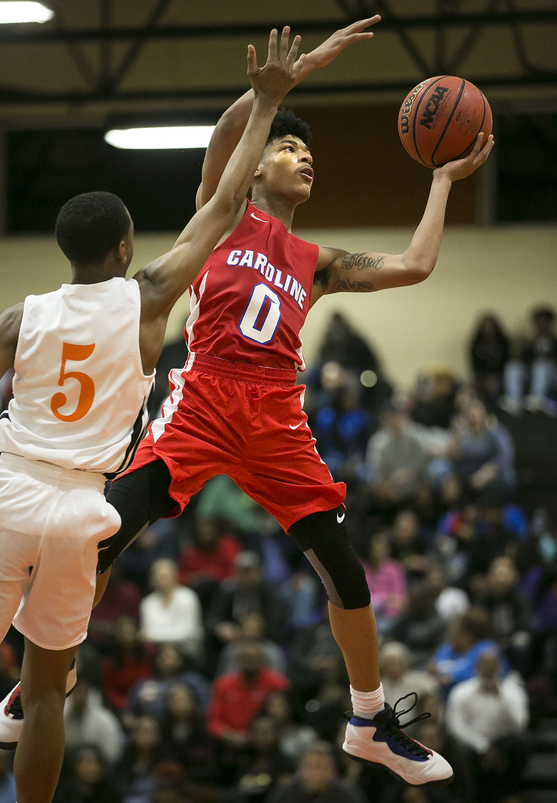 Caroline at James Monroe boys basketball